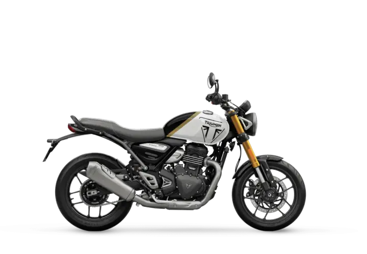 Triumph Speed 400 ficha técnica: moto estilo scrambler, blanca con detalles dorados y negros, horquilla dorada.