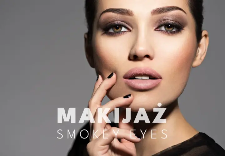 Kobieta z perfekcyjnym makijażem smokey eyes, zmysłowo dotyka swojej twarzy.