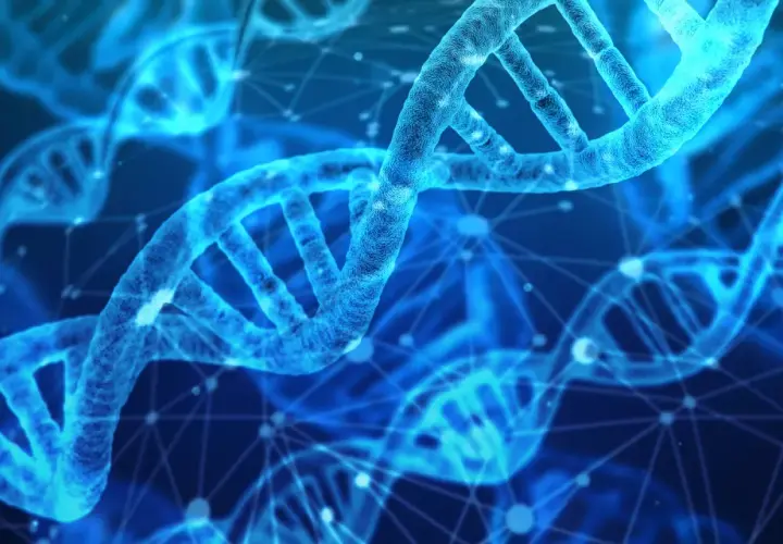 Błękitne, świetliste helisy DNA, symbolizujące postęp w nauce i scjentyzm, unoszą się w cyfrowej przestrzeni.