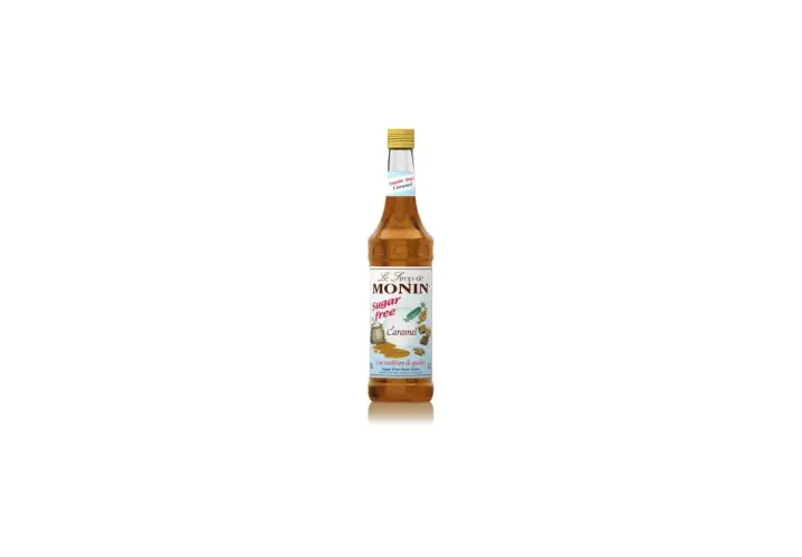 Butelka syropu Monin karmel bez cukru. Idealny do kawy i deserów, by dodać słodkiego, karmelowego smaku.