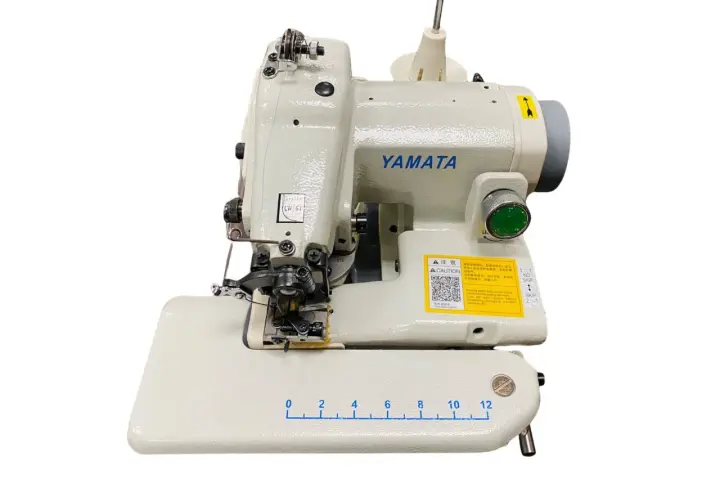 A Yamata sewing machine with a blind stitch foot attachment, ready to demonstrate how to use a blind stitch foot for invisible hems.