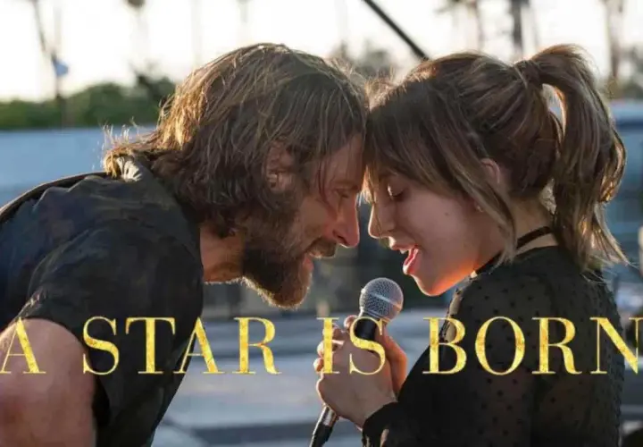 Un uomo e una donna cantano insieme, un momento intimo prima che "A Star Is Born" diventi un tragico addio.
