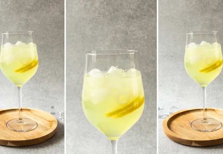 Orzeźwiający limoncello spritz przepis: jasny, cytrynowy drink z lodem i plasterkami cytryny w kieliszku.