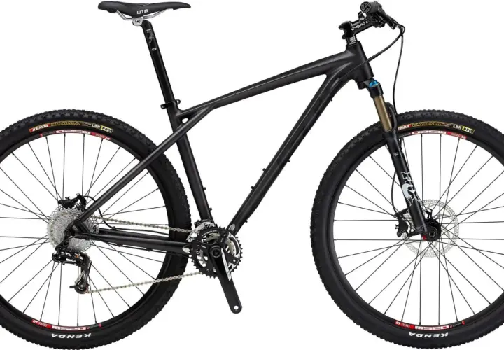 Sleek black GT Zaskar Carbon mountain bike with Kenda tires, Fox suspension fork, and WTB saddle, ready for any trail.