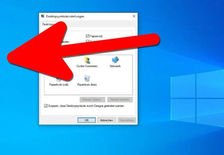 Roter Pfeil zeigt auf das Fenster "Desktopsymboleinstellungen" im Windows 11 Desktop anzeigen. Hier können Sie Symbole wie Papierkorb oder Netzwerk auswählen.