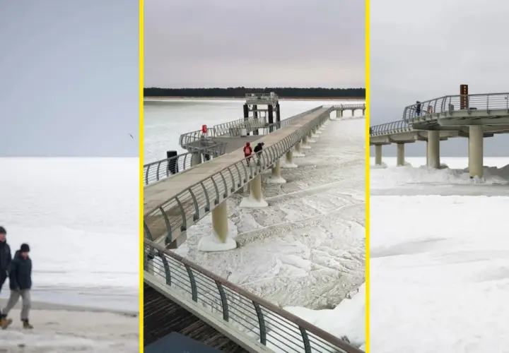 Spacerem po zamarzniętym Bałtyku, kiedy był skuty lodem. Widok na molo i plażę w zimowej scenerii.
