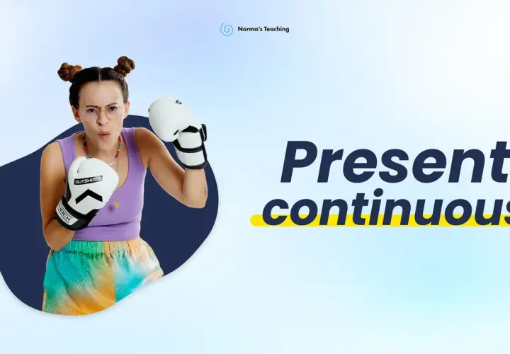Ragazza con guantoni da boxe, pronta a combattere, mentre impara il **present continuous** e il **present simple**.