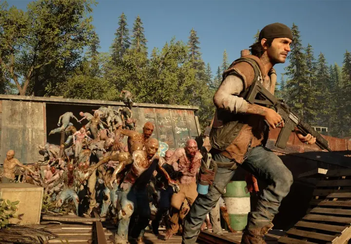 Gracz w Days Gone walczy z hordą zombie. Czas gry to walka o przetrwanie.