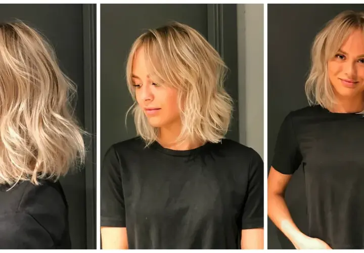 En kvinna med blont, lockigt hår och gardinlugg. Håret är stylat i en modern lob med textur.