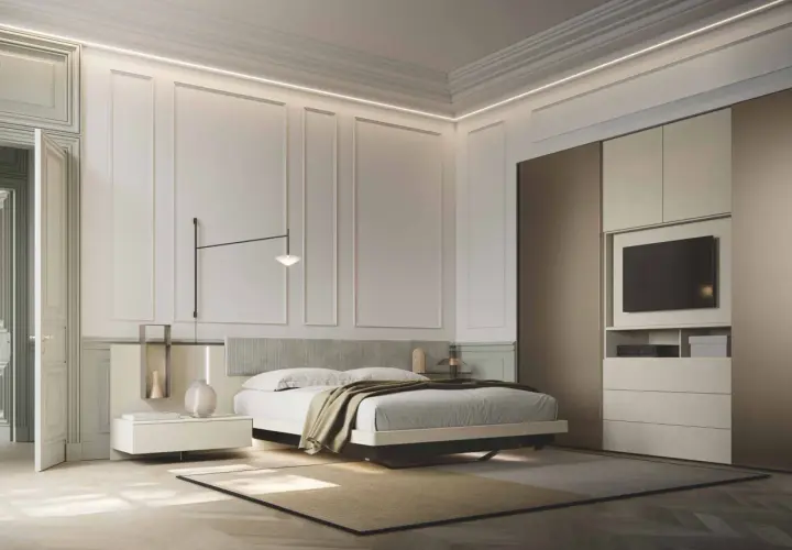 Modern bedroom with a bed, nightstand, wardrobe with TV, and elegant wall paneling.