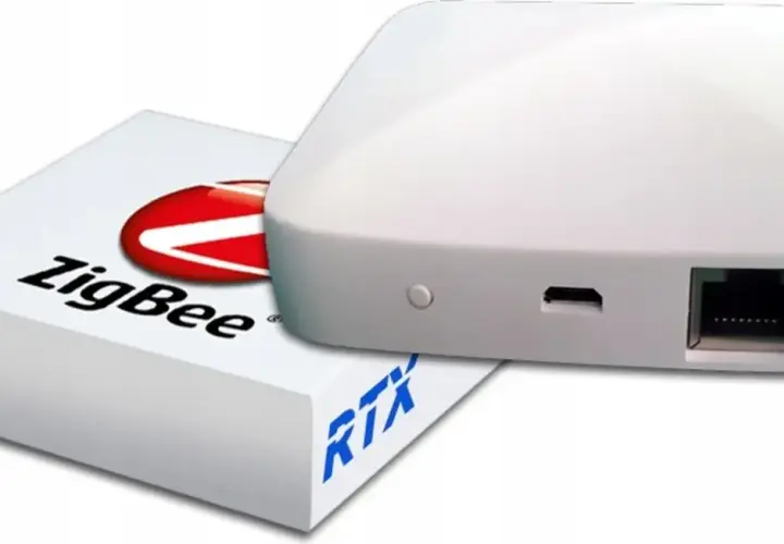 Biały hub ZigBee z logo Tuya Smart, gotowy do stworzenia inteligentnego domu.