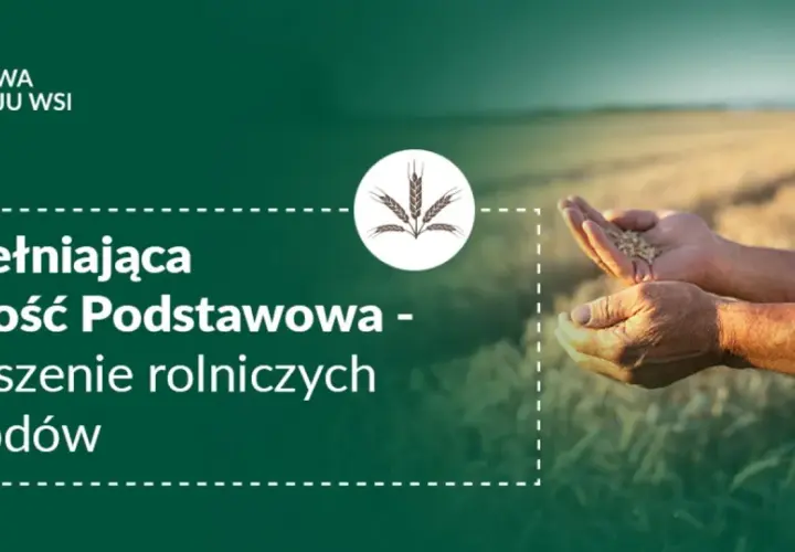Uzupełniająca płatność podstawowa wspiera rolników, zwiększając ich dochody. Widać dłonie trzymające ziarno na tle pola.