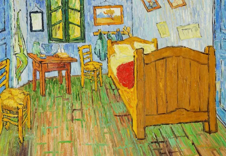 Sypialnia Van Gogha, jeden z jego najsłynniejszych obrazów. Proste meble, jaskrawe kolory, poczucie spokoju.