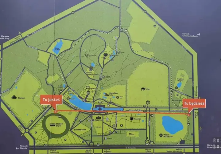 Mapa Parku Śląskiego z zaznaczonymi atrakcjami: zoo, planetarium, rosarium, skansen. Wskazuje drogę do zwiedzania.