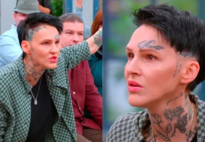 Dominika Chylińska, córka Chylińskiej, z tatuażami na twarzy i szyi, w kratkowanej kurtce, gestykuluje.