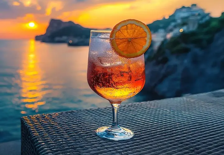 Orzeźwiający Crodino, co to jest? Ten aperitif idealnie pasuje do zachodu słońca nad morzem.