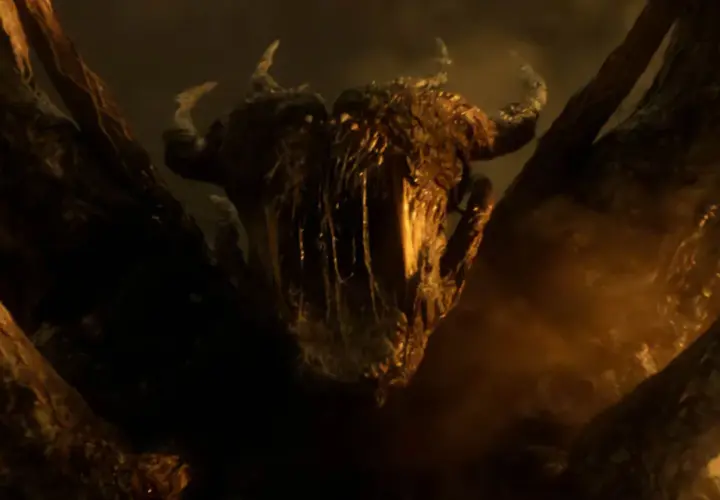 Le flagelleur mental de Stranger Things, une créature cauchemardesque aux cornes et aux tentacules, émerge des ténèbres.