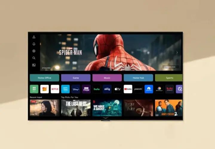 Interfejs webOS TV z filmem Spider-Man na ekranie. Widoczne ikony aplikacji: Netflix, HBO Max, Hulu, Prime Video, Disney+, Apple TV, Peacock, Tubi.