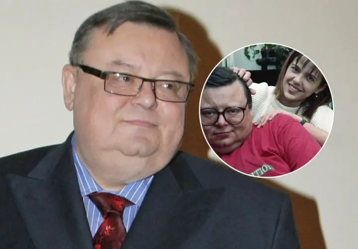 Wojciech Mann z żoną, uśmiechniętą kobietą w białym swetrze, na zdjęciu w okręgu.