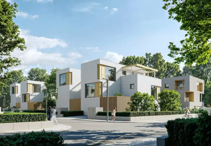 Nowa Królikarnia: nowoczesne domy z drewnianymi akcentami, otoczone zielenią. Ludzie spacerują, rowerzystka przemierza ulicę.