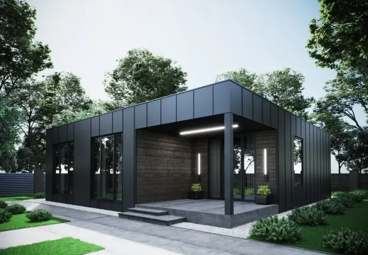 Nowoczesny dom modułowy 100m2 cena pod klucz, z czarną elewacją i drewnianymi akcentami, otoczony zielenią.