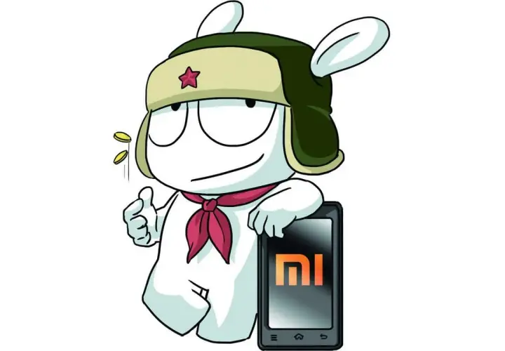 Mi Bunny w czapce z gwiazdą i szaliku, z kciukiem w górę, obok telefonu Redmi z logo MI. Może to symbolizować szybkie uruchamianie (fastboot) lub po prostu dumę z marki.