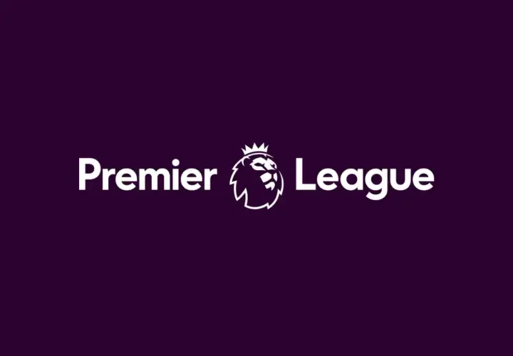 Logo Premier League z białym lwem w koronie i napisem "Premier League" na fioletowym tle.