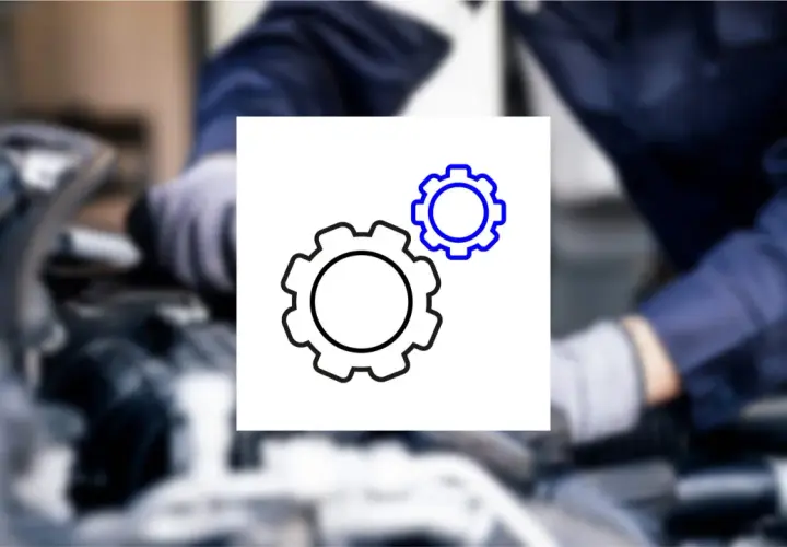 Mechanik bada usterkę. Ikona kół zębatych symbolizuje mechanizm, który może być przyczyną ujemnych korekt paliwowych.