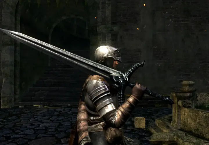 Rycerz w zbroi z wielkim mieczem, na którym widnieje napis "MAY YOUR FOES GET WRECKED FOREVER MORE FOR THE REAL DARK SOULS".