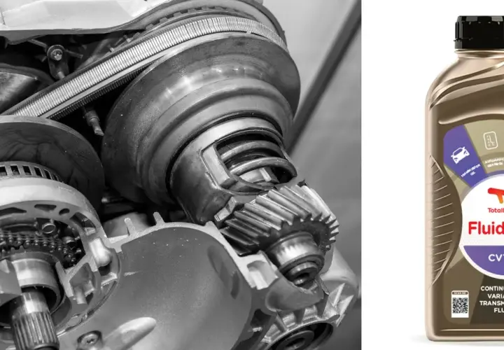 Wnętrze skrzyni biegów CVT i butelka płynu Total Fluidmatic.