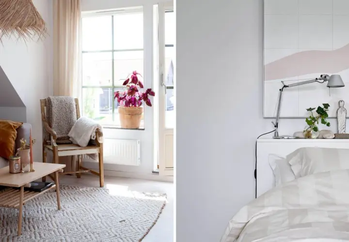 Mysigt litet sovrum med en säng med randigt påslakan och ett vardagsrum med soffa, fåtölj och ett lågt bord.
