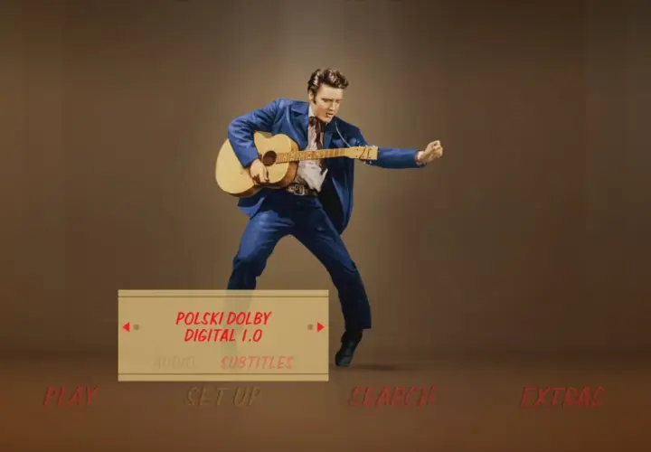 Elvis Presley w niebieskim garniturze gra na gitarze. Menu DVD z opcją "Polski Dolby Digital 1.0" i "Love Me Tender po polsku".