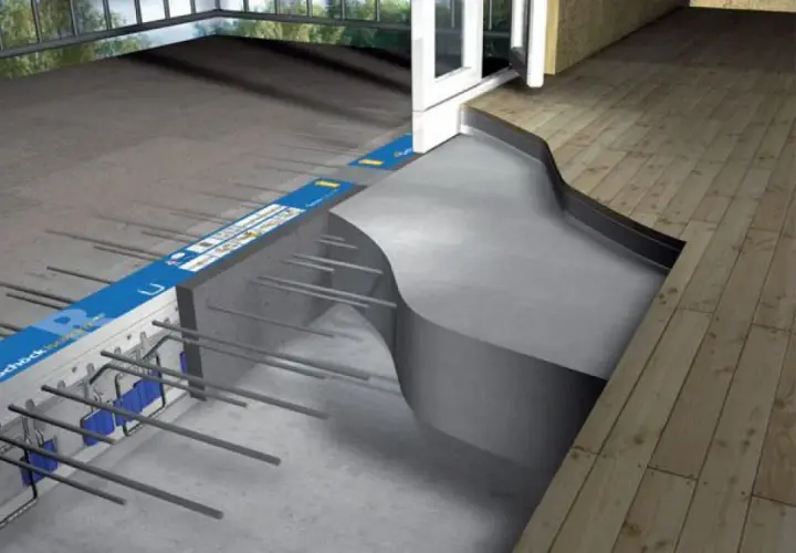Izolacja termiczna i akustyczna przy budowie balkonu. Widoczny system profili i zbrojenia, jak zazbroić balkon, by był energooszczędny.