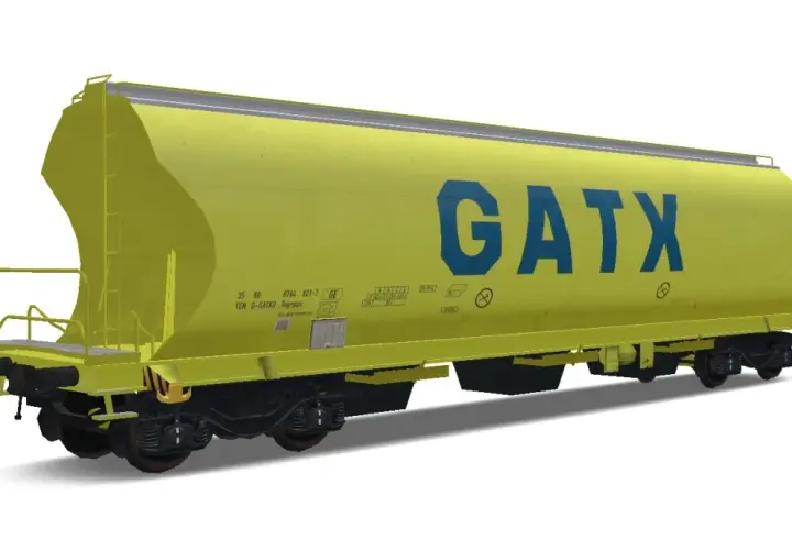 Żółty wagon kolejowy GATX, z niebieskim napisem. Zastanawiasz się, ile waży wagon kolejowy? Ten model jest gotowy do transportu!