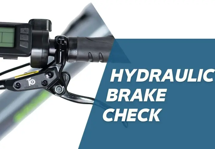 Close-up of an e-bike's hydraulic brake lever and display. Learn about old brake fluid symptoms and how to check your brakes.