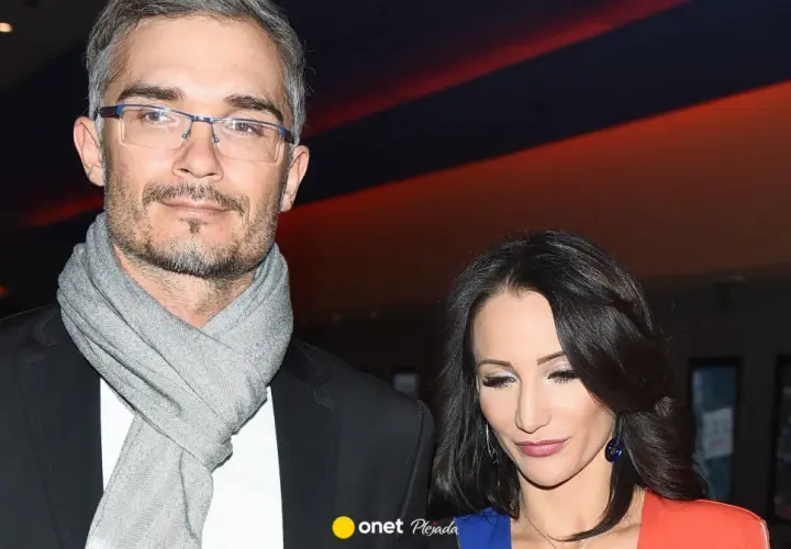 Mąż Justyny Steczkowskiej, w okularach i szarym szalu, u boku artystki.
