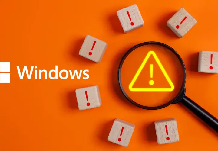 Windows-Logo, Lupe mit Warnsymbol, Holzklötze mit Ausrufezeichen. Ein Hinweis auf eine Systemprüfung wie chkdsk /scan.