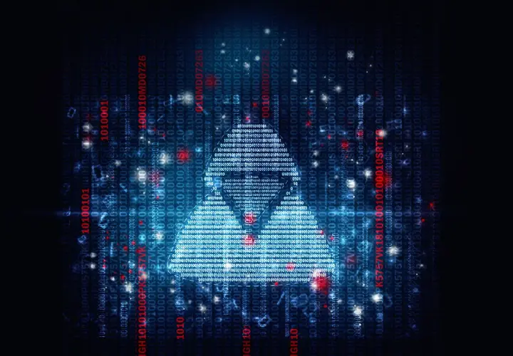 Trójkąt z kodu binarnego na tle danych, symbolizujący zagrożenie ransomware.
