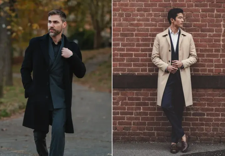 Deux hommes portant des manteaux, un noir et un beige, devant un mur de briques et dans un parc.