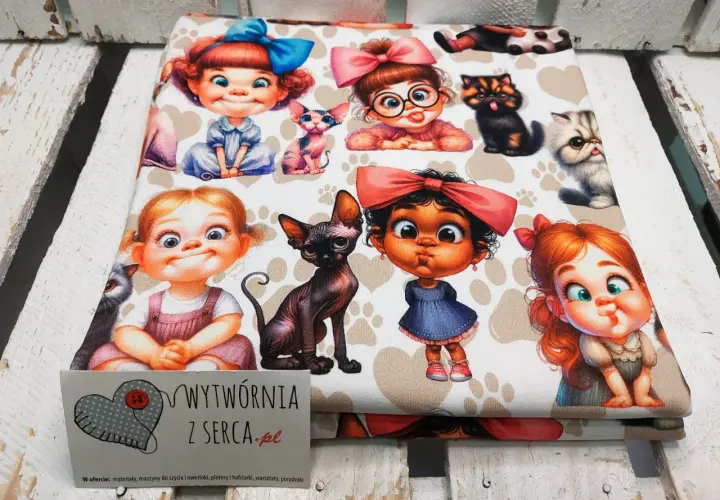 Urocza dresówka dla dzieci z motywem słodkich dziewczynek i kotków. Idealna na ubranka dla najmłodszych.