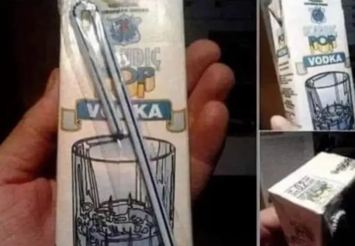 Opakowanie wódki z grafiką szklanki i słomki. Pytanie: skutki picia wódki przez słomkę, dlaczego upijamy się szybciej.