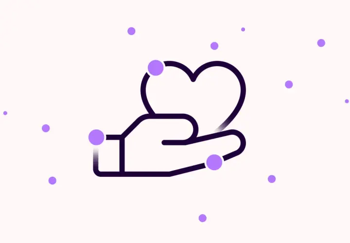 A hand holds a heart, surrounded by floating purple dots. This imagery can affect labeling by visually representing care and connection.