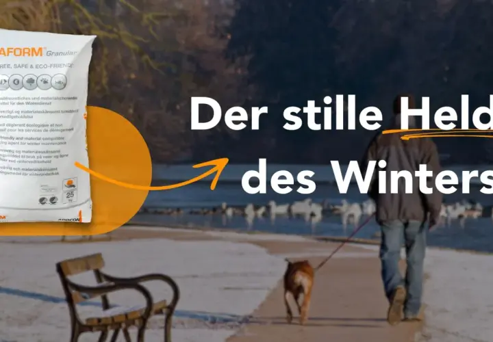 VIAFORM Granular: eine umweltfreundliche streusalz alternative für den Winterdienst. Ein Mann mit Hund spaziert am Wasser.