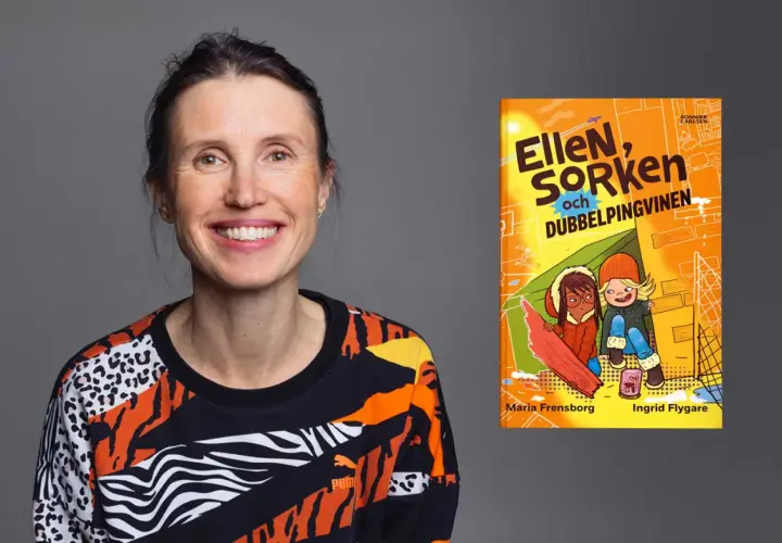 Maria Frensborg ler glatt bredvid boken "Ellen, Sorken och dubbelpingvinen".