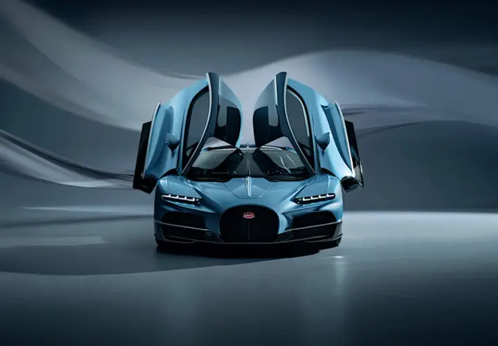 Niebieskie, najnowsze Bugatti z otwartymi drzwiami, prezentujące swoją potęgę i elegancję.