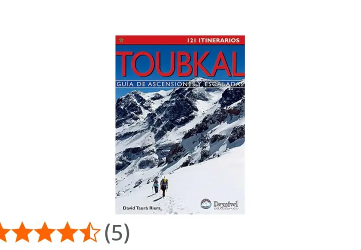 Guía de ascensiones y escaladas del Toubkal, Marruecos. Dos montañeros se adentran en un paisaje nevado.