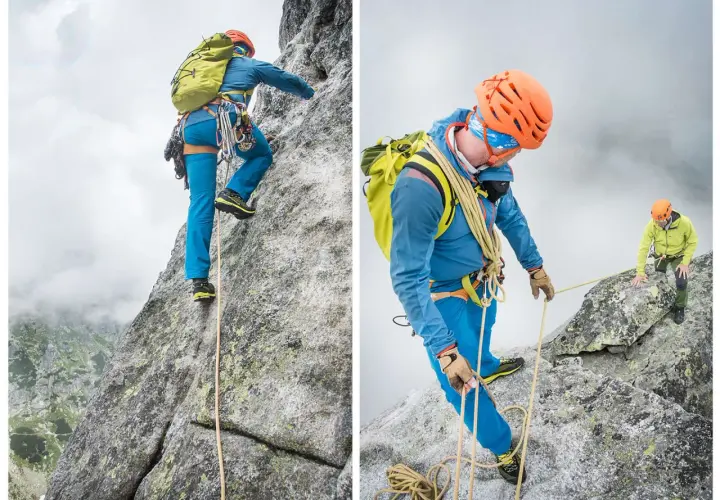 Dwóch alpinistów wspina się na mnicha w Tatrach. Jeden z nich, w niebieskiej kurtce, pokonuje skalną ścianę, drugi, w zielonej kurtce, asekuruje go.