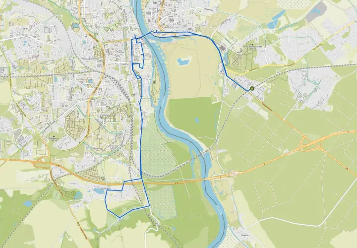 Trasa rowerowa wzdłuż Odry, prowadząca przez Frankfurt nad Odrą i okolice, z widocznymi mostami i terenami zielonymi.