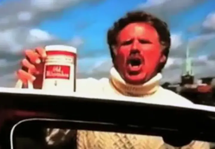 Will Ferrell med solbränd hy och vit polotröja håller upp en burk Old Spice.