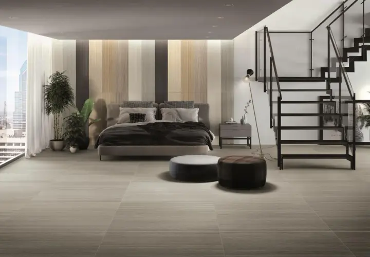Camera da letto moderna con letto king-size, scala in metallo e un elegante pavimento facile da pulire.